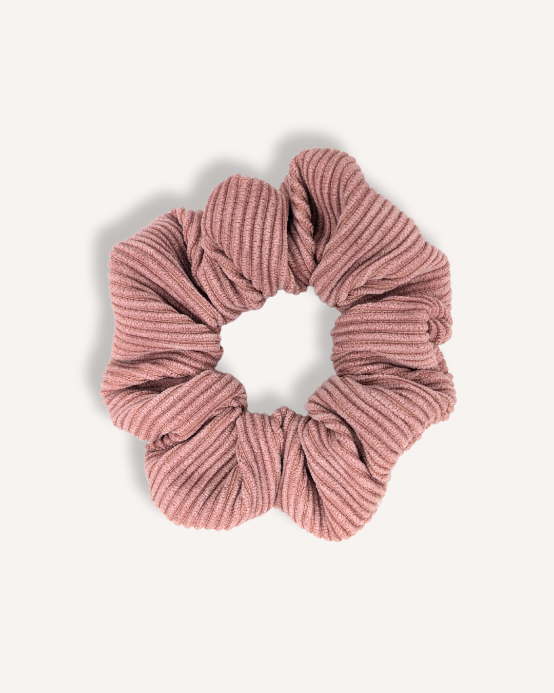 Coletero de pana rosa empolvado