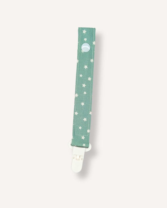 Chupetero fondo mint estrellitas blancas